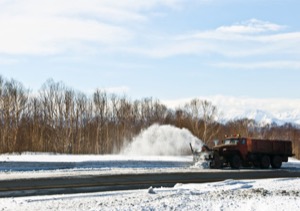 spring-loaded plows